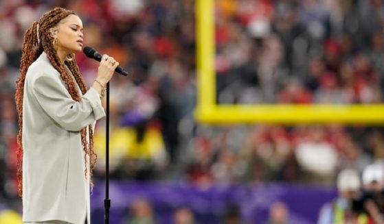 Singer Andra Day performs "Lift Every Voice and Sing" -- known as the "Black National Anthem" -- prior to Sunday's Super Bowl LVIII in Las Vegas.