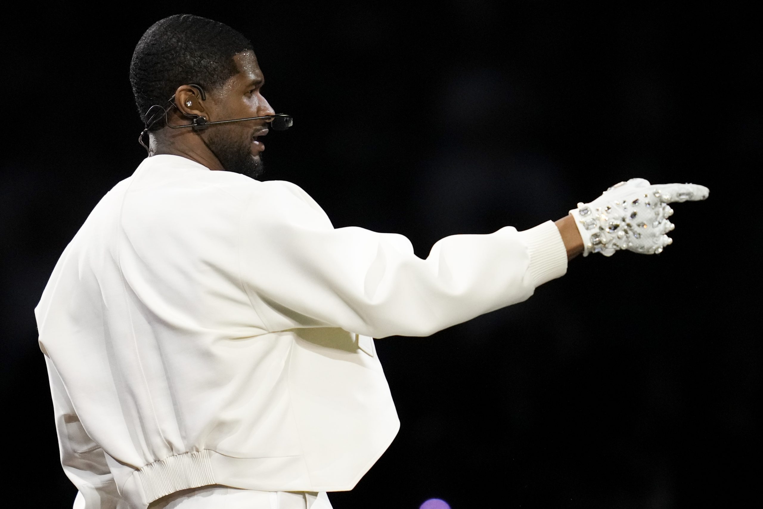 Usher performs during halftime of Super Bowl LVIII in Las Vegas, Nevada, on Sunday.