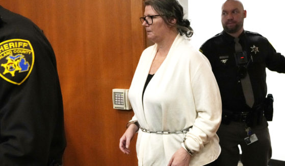 Jennifer Crumbley walks into the Oakland County courtroom of Judge Cheryl Matthews in Pontiac, Michigan, before being found guilty on four counts of involuntary manslaughter on Tuesday.