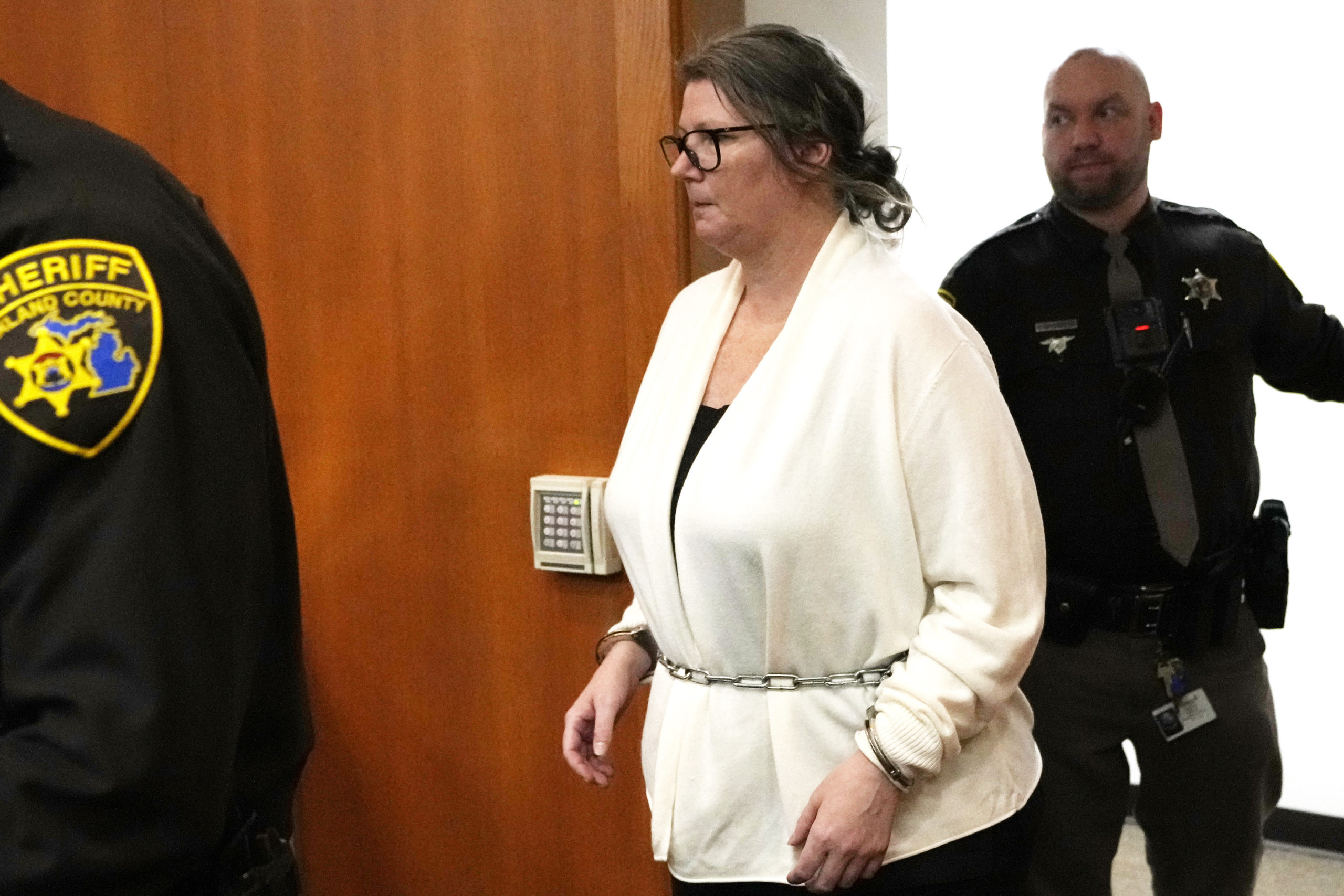 Jennifer Crumbley walks into the Oakland County courtroom of Judge Cheryl Matthews in Pontiac, Michigan, before being found guilty on four counts of involuntary manslaughter on Tuesday.