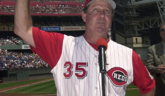 Don Gullett waves to the crowd before being inducted into the Cincinnati Reds Hall of Fame before the Reds played the New York Mets in Cincinnati on July 21, 2002.