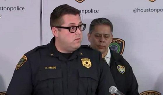 Houston Police Homicide Division Cmdr. Chris Hassig addresses the media on Monday.