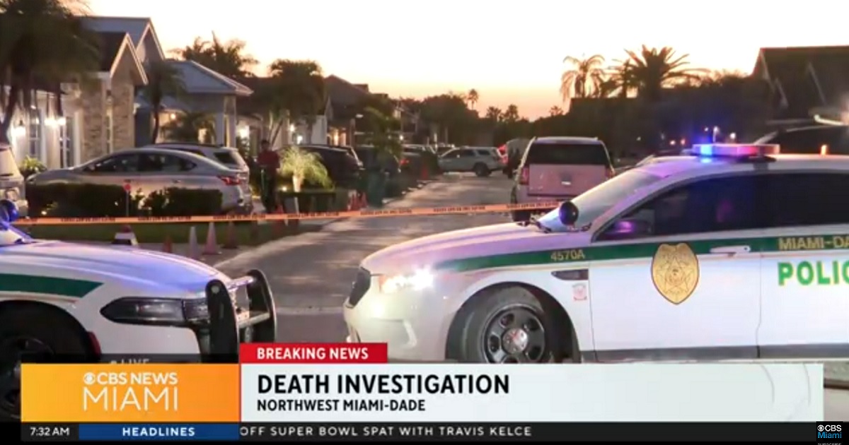 Investigators on the scene of a shooting in Miami early Wednesday where a car owner confronted two criminals.