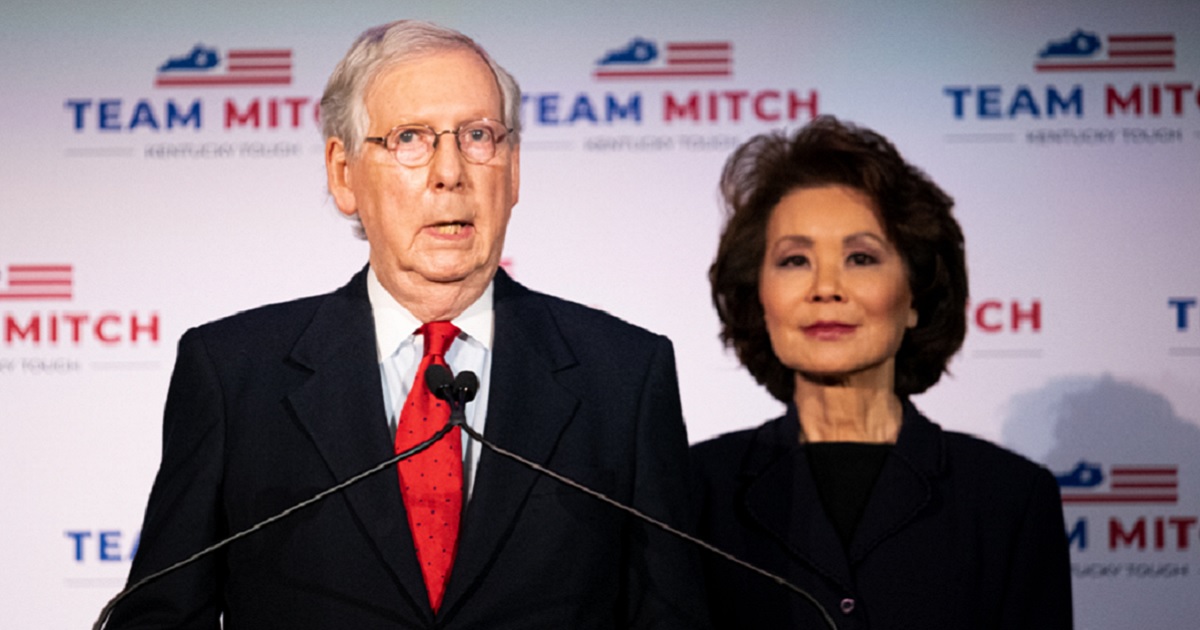 Senate Minority Leader Mitch McConnell and his wife, Elaine Chao, are pictured in a 2020 file photo after McConnell's re-election.