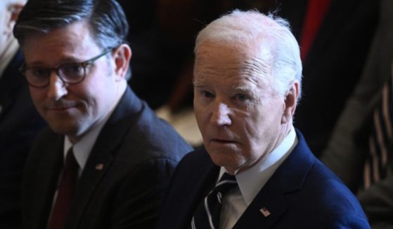 President Joe Biden, right, and Speaker of the House Mike Johnson attend an event at the U.S. Capitol in Washington, D.C., on Thursday.