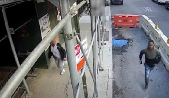 Two thieves were sent running by a brave New York City doorman on Sunday.