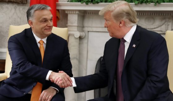 Then-President Donald Trump shakes hands with Hungarian Prime Minister Viktor Orban during a May 2019 meeting in the Oval Office.