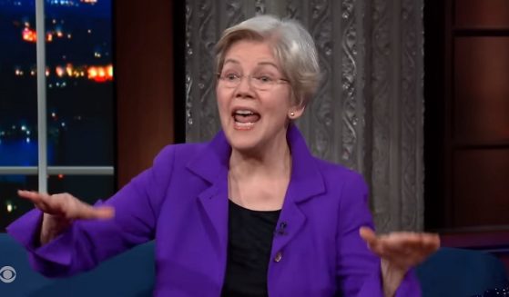 Massachusetts Sen. Elizabeth Warren sings Monday night on "The Late Show with Stephen Colbert."