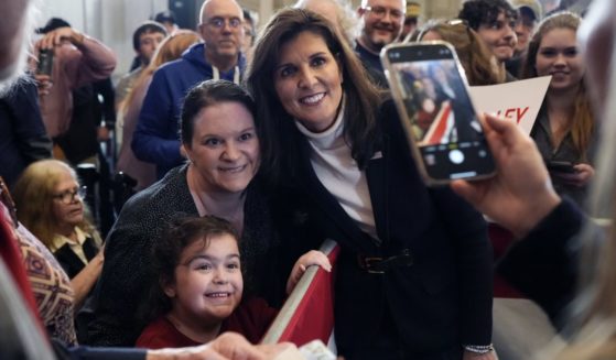 Nikki Haley poses for a selfie with supporters