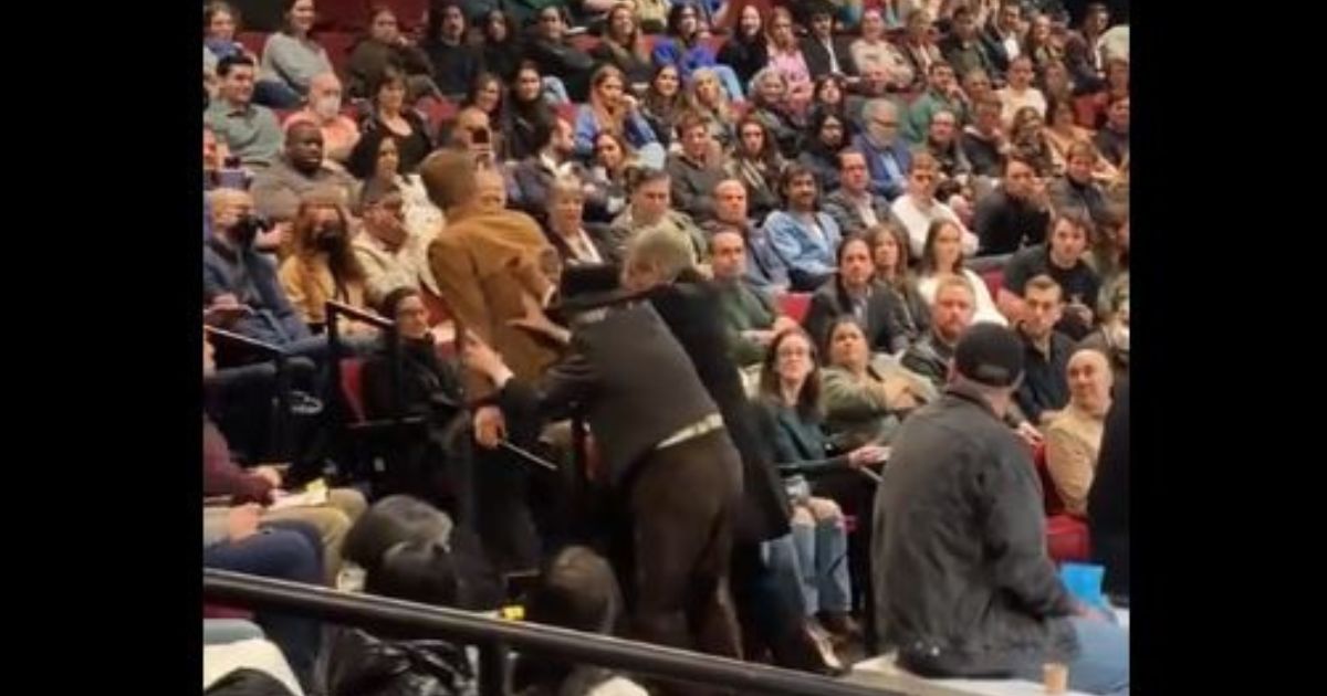A climate activist on Thursday interrupted a Broadway performance of "An Enemy of the People," starring Sopranos actor Michael Imperioli, who, with other actors, stayed in character while they pushed the man out of the theater.