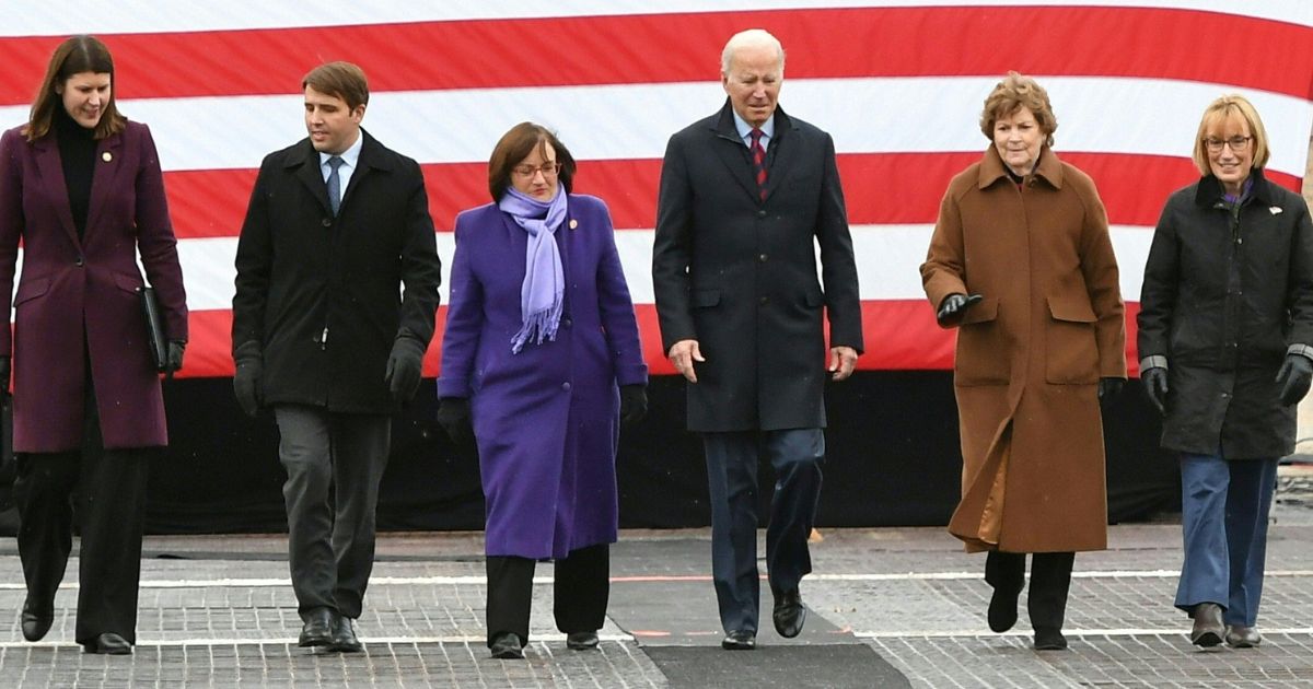 Annie Kuster, Joe Biden and others tour the NH 175 bridge over the Pemigewasset River in Woodstock, New Hampshire