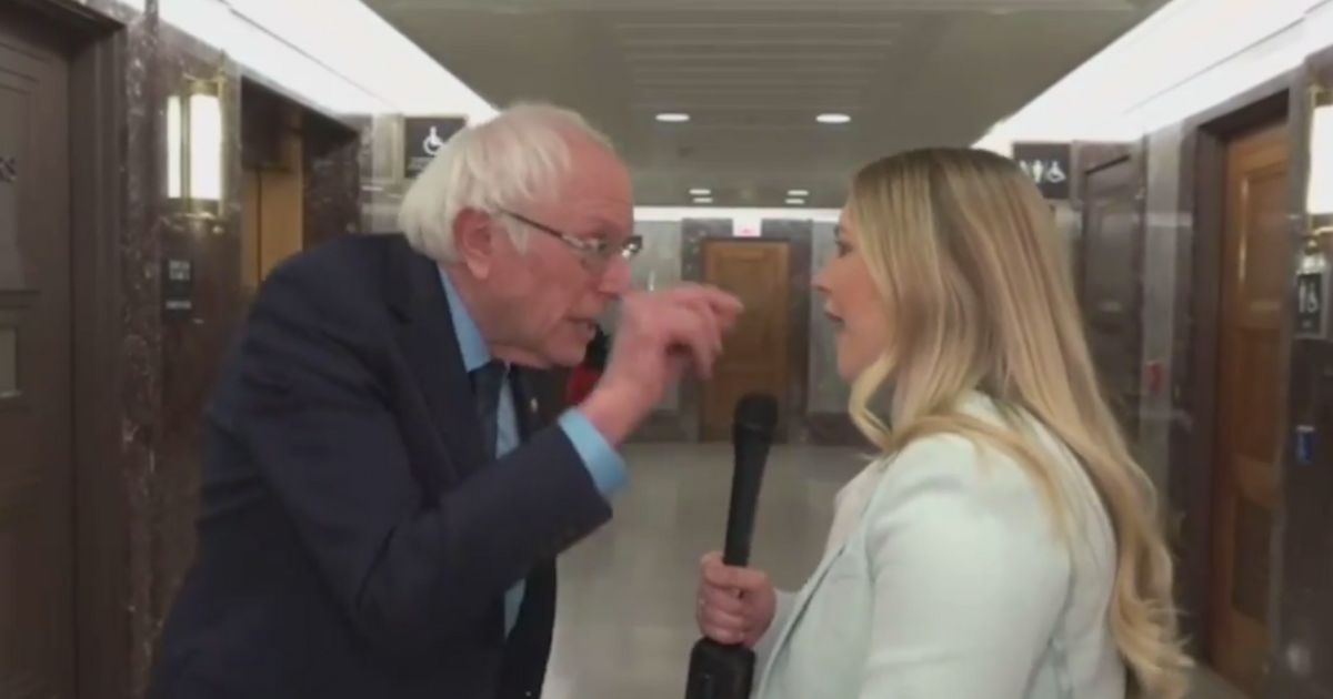 Sen. Bernie Sanders, of Vermont, left, erupted at Fox Business correspondent Hillary Vaughn on Thursday, telling her during an exchange inside the Capitol, “I can yell as loud as you.”
