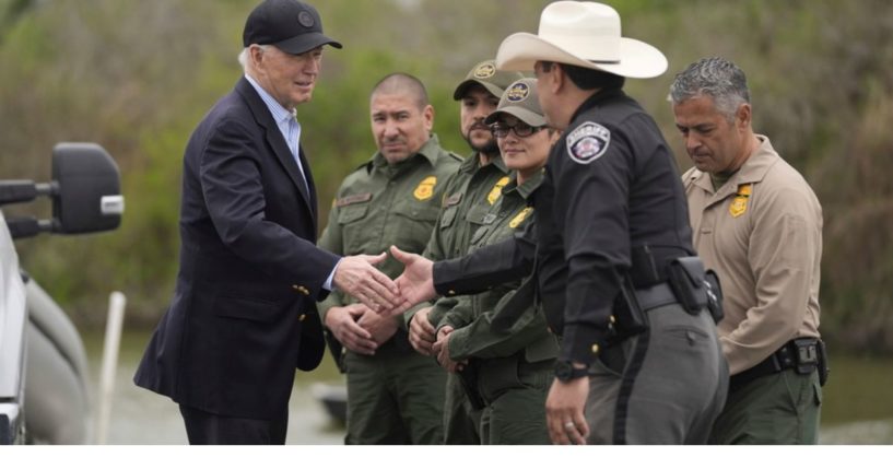 President Joe Biden talks with U.S. Border Patrol and local officials Thursday as he looks over the southern border in Brownsville, Texas, along the Rio Grande.