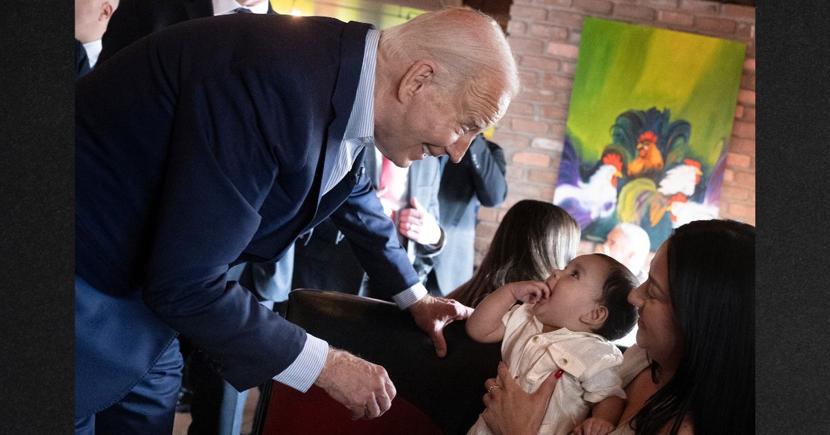 President Joe Biden wandered off the stage area to visit with a mother and baby while his campaign manager was introducing him during a campaign event at a Mexican restaurant in Phoenix, Arizona, on Tuesday.