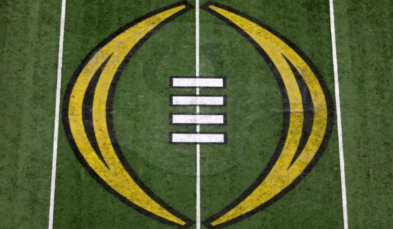 The 2022 CFP National Championship logo is seen on the field before the game between the Georgia Bulldogs and the Alabama Crimson Tide during the 2022 CFP National Championship Game at Lucas Oil Stadium, Jan. 10, 2022, in Indianapolis, Indiana.