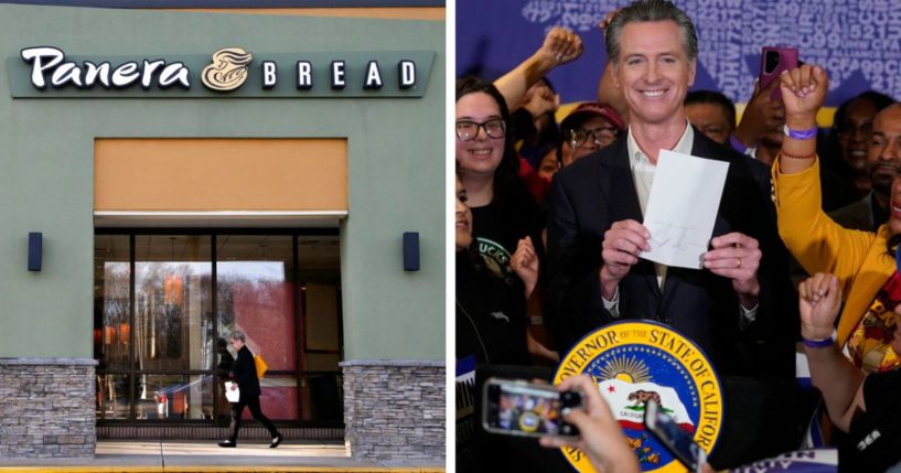 Calif. Gov. Gavin Newsom signs the fast food bill surrounded by fast food workers at the SEIU Local 721 in Los Angeles on Sept. 28.