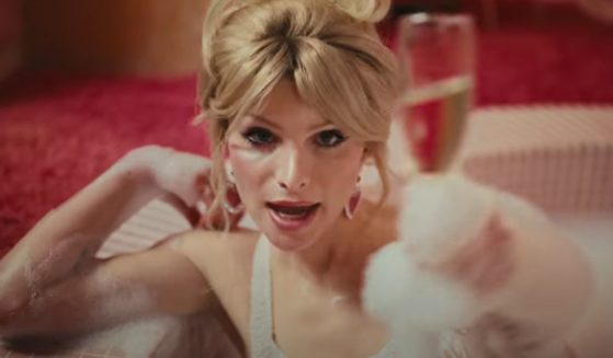 Dylan Mulvaney is seen in the video for his song "Days of Girlhood."