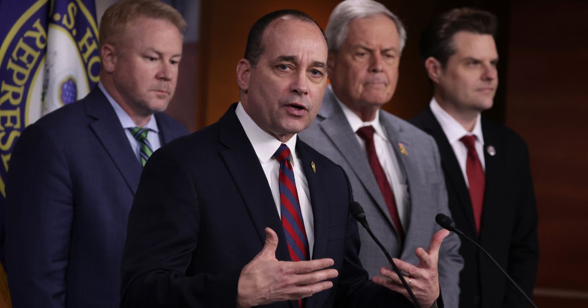House Freedom Caucus Chairman Rep. Bob Good speaks as, from left, Rep. Warren Davidson, Ralph Norman and Matt Gaetz listen during a news conference at the U.S. Capitol in Washington on Feb. 13.