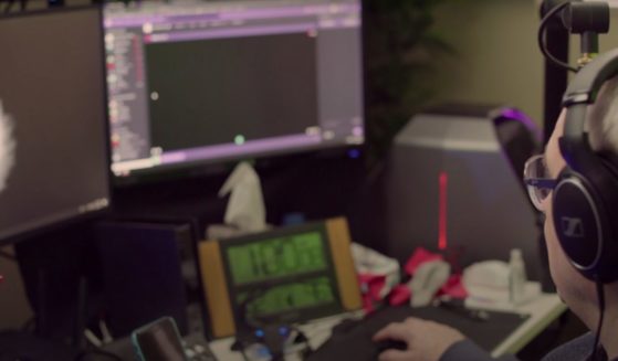 The streamer known as "GrndpaGaming" sitting in front of his monitors.