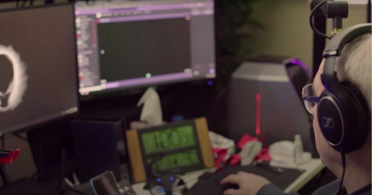 The streamer known as "GrndpaGaming" sitting in front of his monitors.