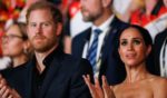 Prince Harry, left, and Meghan, Duchess of Sussex, right, are seen during the closing ceremony of the Invictus Games Düsseldorf 2023 in Düsseldorf, Germany, on Sept. 16.