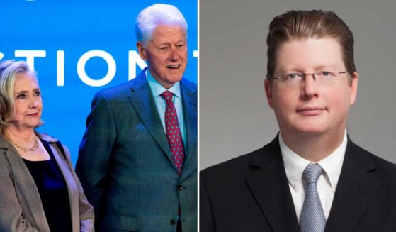 Hillary and Bill Clinton and Bryan Malinowski
