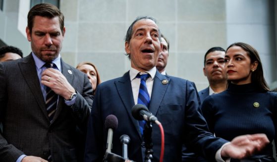 Democratic Rep. Jamie Raskin, center, speaks during a news conference - surrounded by other House Democrats - during a break in the deposition of Hunter Biden in Washington, D.C., on Wednesday.