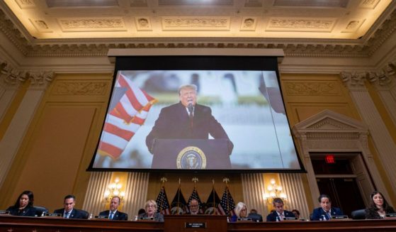 Former U.S. President Donald Trump is displayed on a screen during a meeting of the Select Committee to Investigate the January 6th Attack on the U.S. Capitol in the Canon House Office Building on Capitol Hill in Washington, D.C., on Dec. 19, 2022.