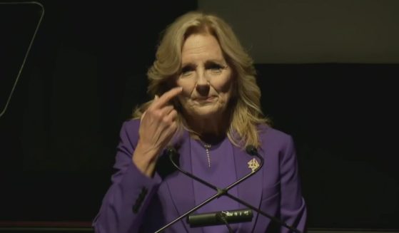 Jill Biden being interrupted during a campaign speech