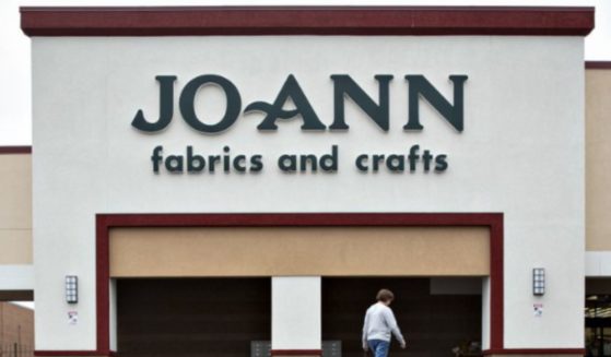A woman walks into a Joann store in Davenport, Iowa, on Sept. 19, 2018.