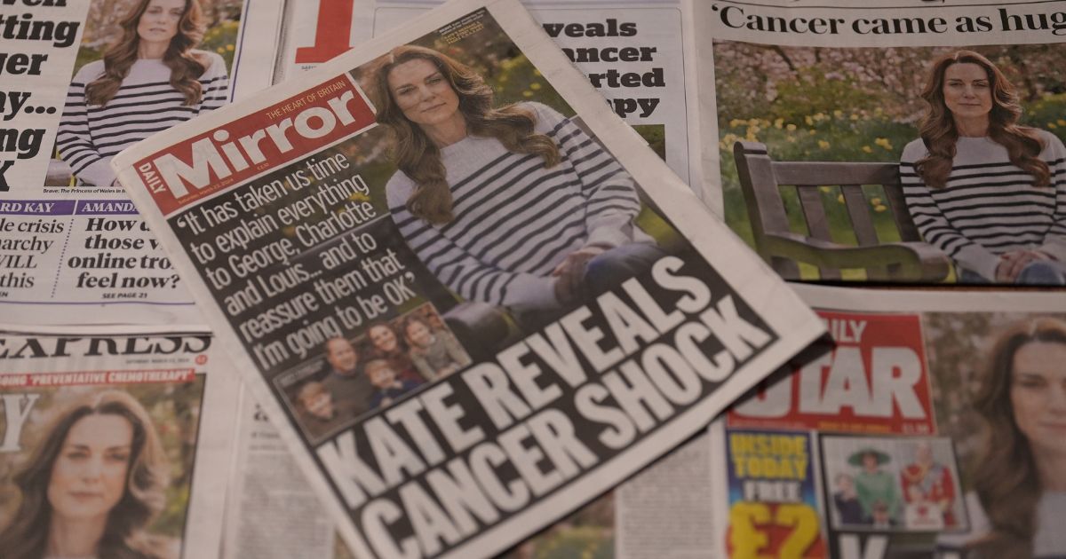 U.K. newspaper front pages, including The Daily Telegraph, Daily Express, The Star, The Daily Mail, The Guardian and The Times, display an image of Britain's Catherine, Princess of Wales from an announcement video on her cancer diagnosis in London, England, on Saturday.