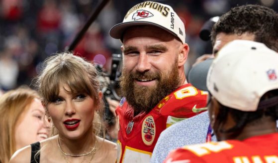 Travis Kelce and Taylor Swift celebrate after the Kansas City Chiefs beat the San Francisco 49ers in the Super Bowl at Allegiant Stadium in Las Vegas on Feb. 11.