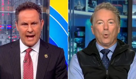 Fox News host Brian Kilmeade, left, questions Sen. Rand Paul, right, on "Fox & Friends."