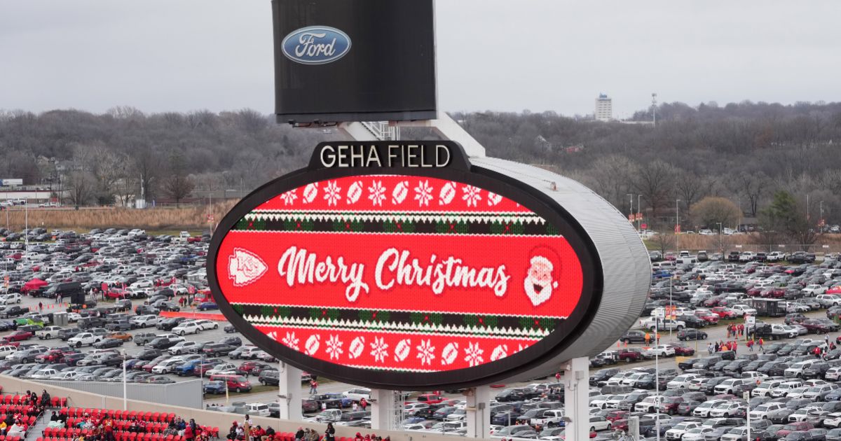 The video board at Arrowhead Stadium in Kansas City, Missouri, displays "Merry Christmas" to fans during the NFL's Christmas Day game be