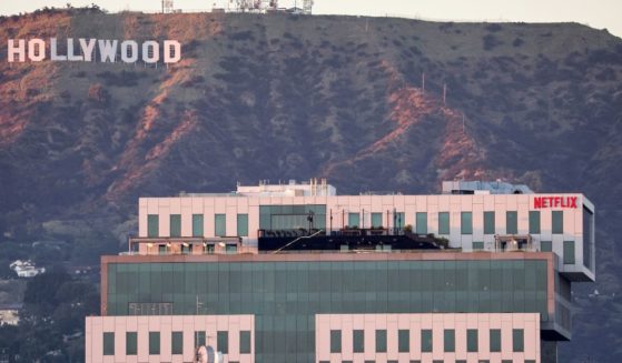 Netflix studios in Los Angeles, California, sitting in front of the Hollywood sign.