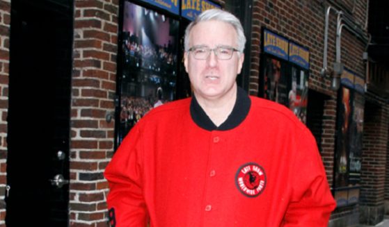 Former ESPN and MSNBC commentator is pictured in a 2015 file photo outside "The Late Show with David Letterman" at Ed Sullivan Theater in New York City.