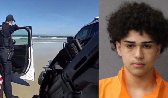Officers with the Volusia Sheriff's Office had a standoff with a gun-wielding teen who ran into the ocean at New Smyrna Beach in Florida on Thursday. The suspect, Felixander Solis-Guzman, 16, eventually surrendered.