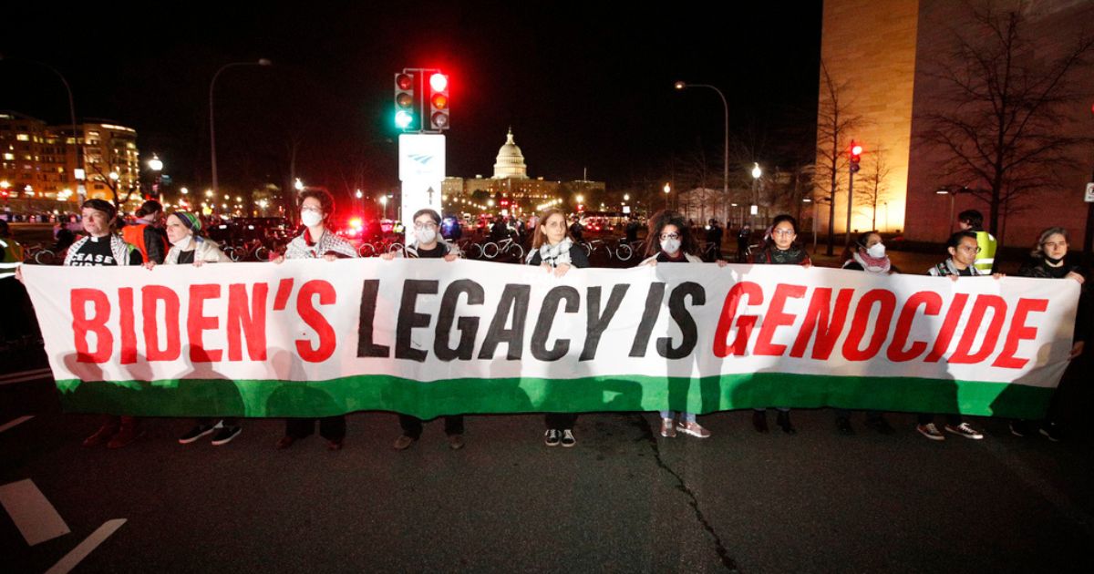 Protesters block Pennsylvania Avenue during a pro-Palestinian demonstration near the U.S. Capitol in preparation for President Joe Biden's State of the Union address to a joint session of Congress, Thursday, in Washington D.C.