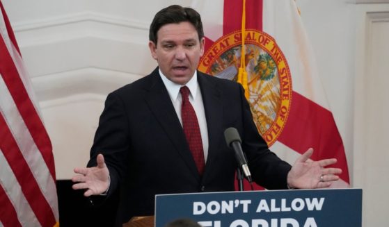 Ron DeSantis speaks at a news conference in Miami Beach