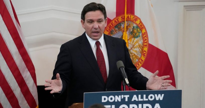 Ron DeSantis speaks at a news conference in Miami Beach