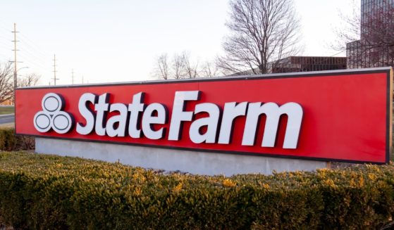 A State Farm sign is seen at the insurance giant's headquarters in Bloomington, Illinois, on March 26, 2022.