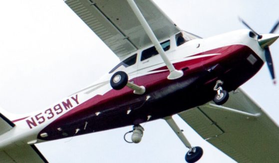 An FBI surveillance aircraft is shown.