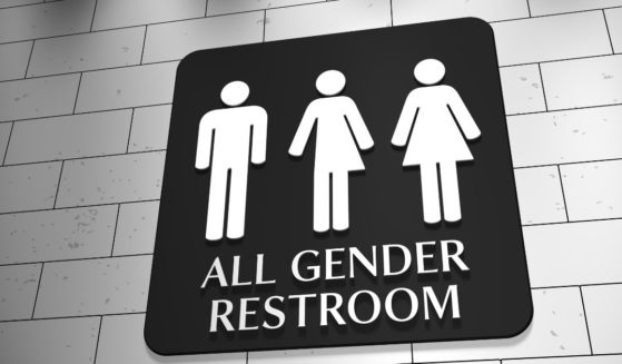 About 20 students at a New York high school staged a protest over their district's policy to allow transgender students to use whatever bathroom they want.