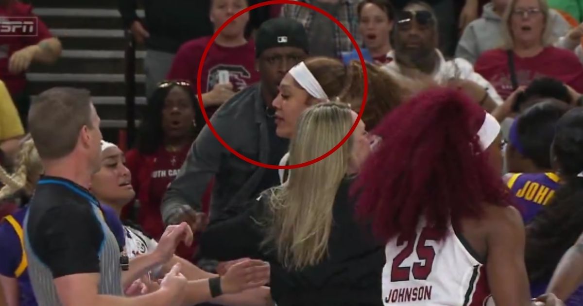 Trayron Milton, circled, was reportedly arrested and faces third-degree assault and battery and disorderly conduct charges after jumping onto the court during Saturday's brawl between the LSU and South Carolina women's basketball teams in the SEC Championship game.