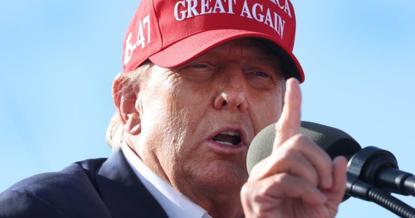 Republican presidential candidate and former President Donald Trump speaks to supporters during a rally at the Dayton International Airport in Vandalia, Ohio, on Saturday.