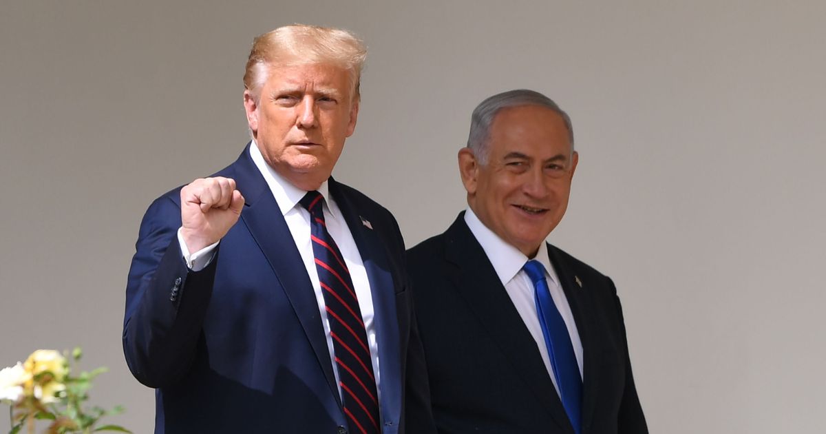 Then-President Donald Trump, left, and Israeli Prime Minister Benjamin Netanyahu, right, arrive to participate in the signing of the Abraham Accords at the White House in Washington, D.C., on Sept. 15, 2020.