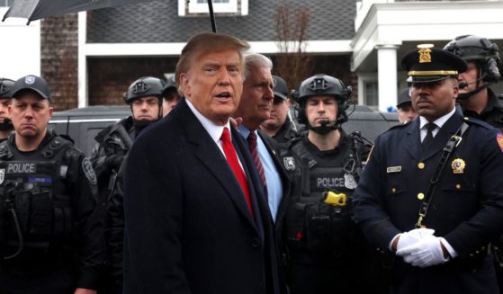 Former President Donald Trump speaks to the media after attending the wake of slain NYPD Officer Jonathan Diller on Thursday at a funeral home in Massapequa, New York.