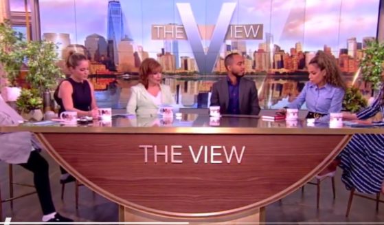 Sunny Hostin (second from right), co-host of "The View," looks down before telling guest Coleman Hughes that his position about race and socioeconomic status is "fundamentally flawed."