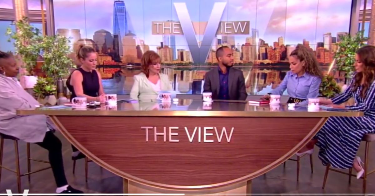 Sunny Hostin (second from right), co-host of "The View," looks down before telling guest Coleman Hughes that his position about race and socioeconomic status is "fundamentally flawed."