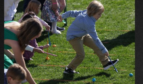 Children participate in the 2023 White House Easter Egg Roll on the South Lawn of the White House.